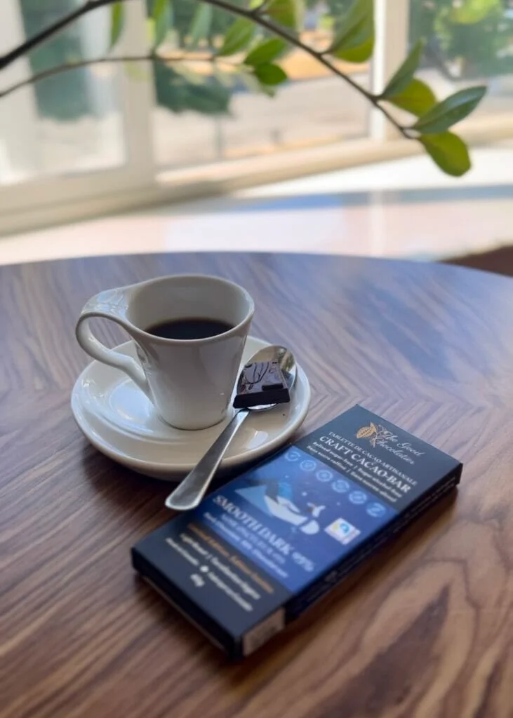 Home 20 smooth dark 95 chcoolate bar on table with a coffee